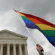 The multicolored flag of the gay-rights movement is seen outside the Supreme Court in Washington, D.C., June 26. 2015, after the court’s historic decision making gay marriage a nationwide right.
MLADEN ANTONOV/AFP/Getty Images